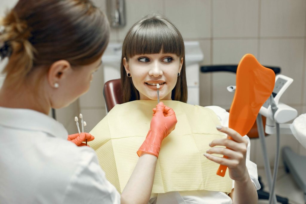 a woman getting her dental veneers